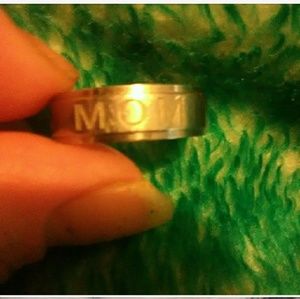 Stainless steel ring. With mom engraved